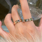 Six-Diamond Zircon Ring