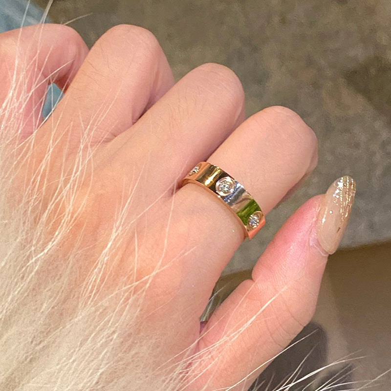 Six-Diamond Zircon Ring
